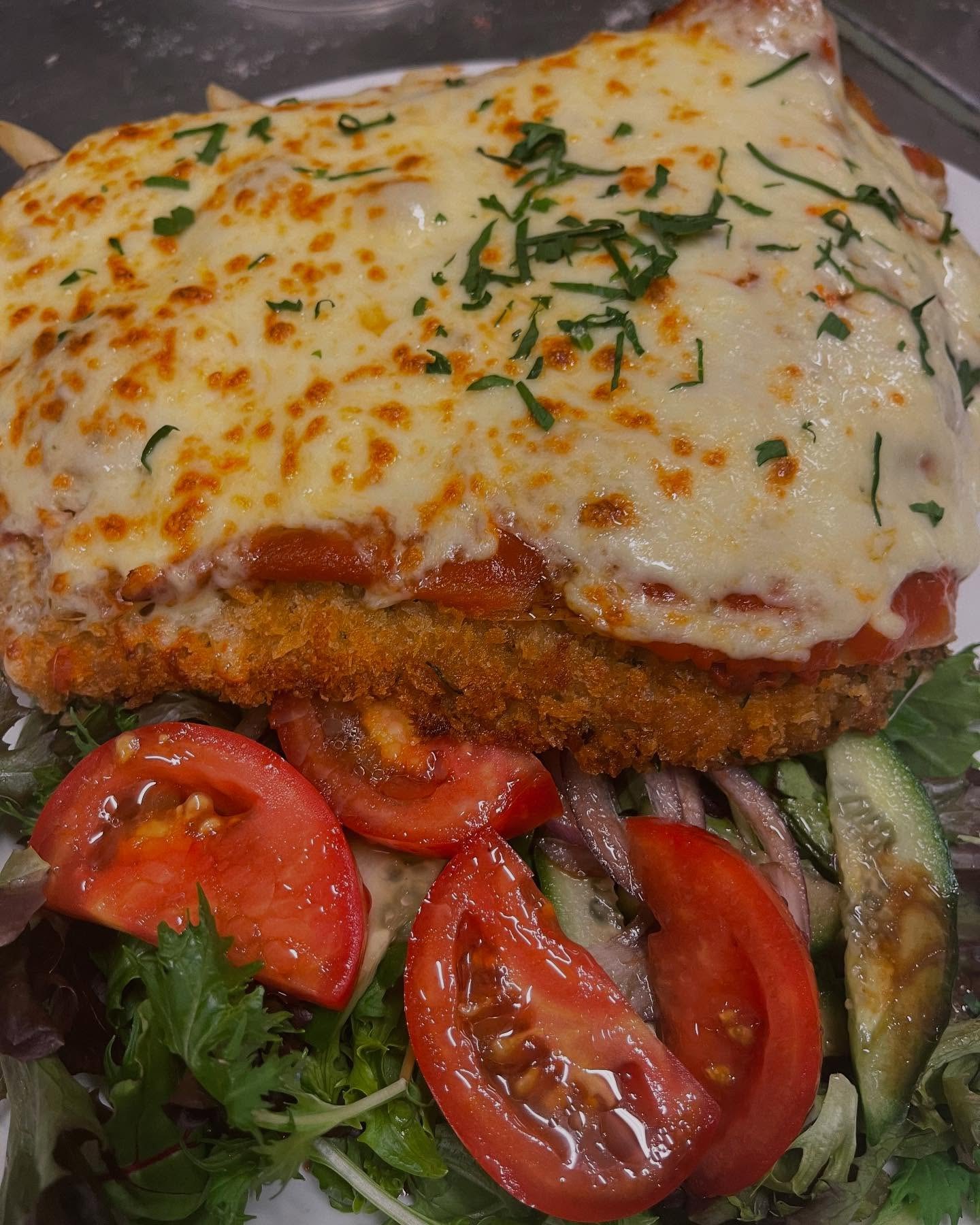 Parmigiana with fresh tomato salad